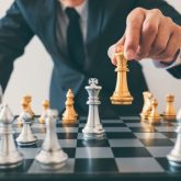 businessman leadership playing chess thinking strategy plan about crash overthrow opposite team development analyze successful corporate