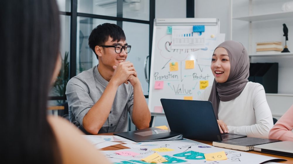 multiracial group young creative people smart casual wear discussing business brainstorming meeting ideas mobile application software design project modern office 7861 3067 scaled